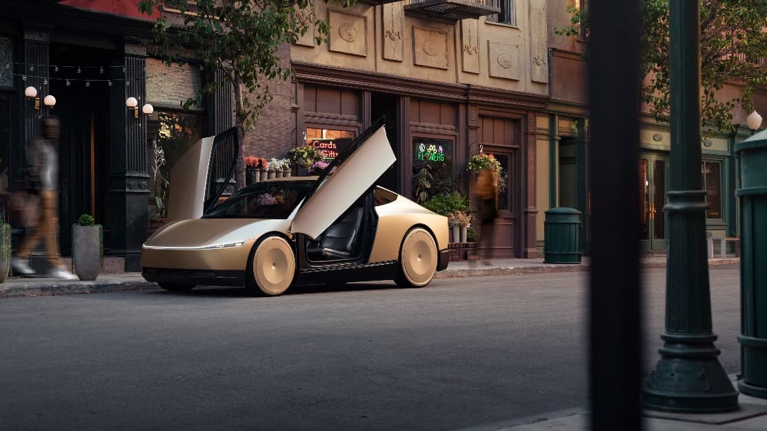 A car with the doors open
Description automatically generated