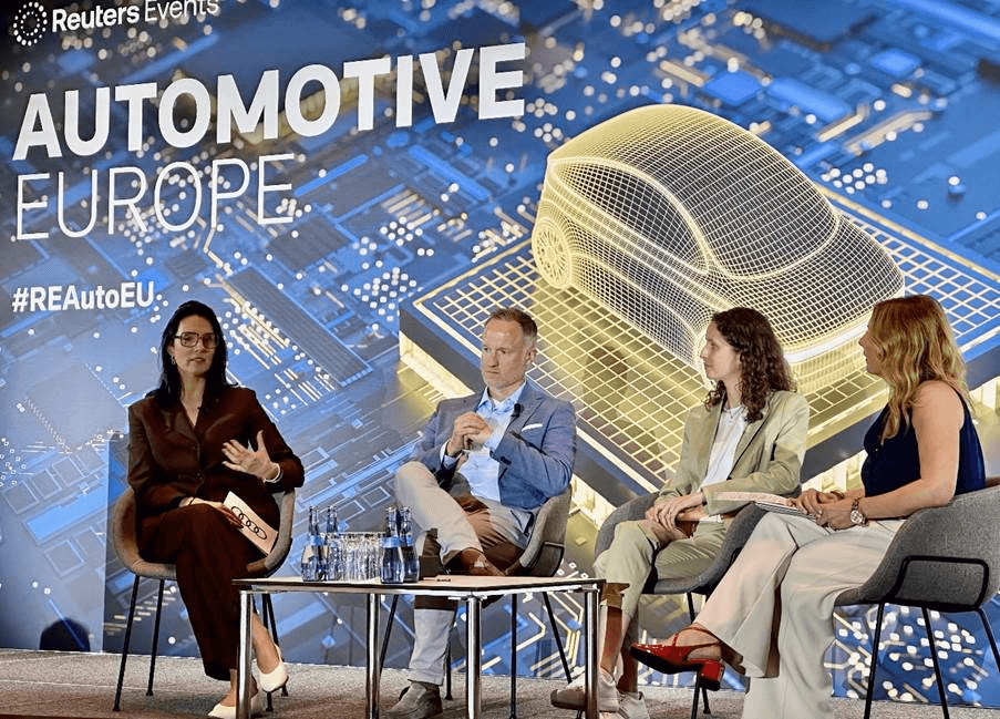 Representatives from Audi, Microsoft and ETAS discuss the impact of AI onstage at Reuters Automotive Europe event. Source: Counterpoint Research.