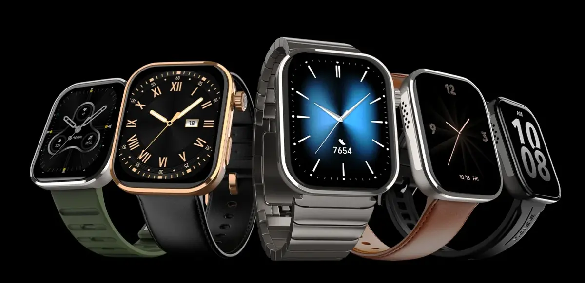 A group of watches on a black background
Description automatically generated