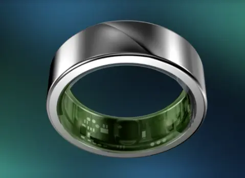 A silver ring with a green rim
Description automatically generated